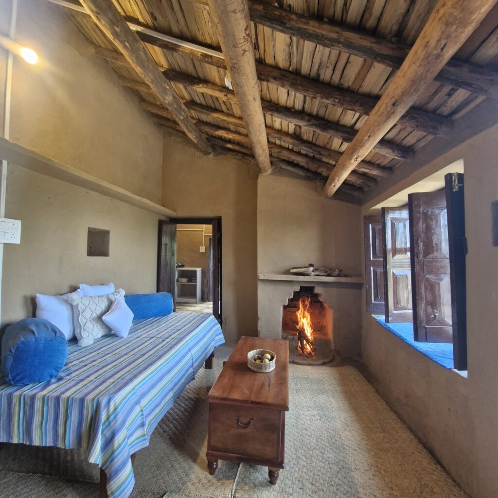 Traditional stone and mud Kumaoni house stay in a forest near Almora